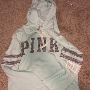 A teal PINK hoodie